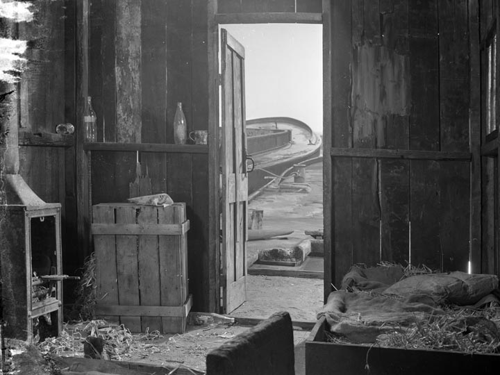 The Long Memory-Interior of Jackson's hut, a kindly old hermit from whom he rents the barge